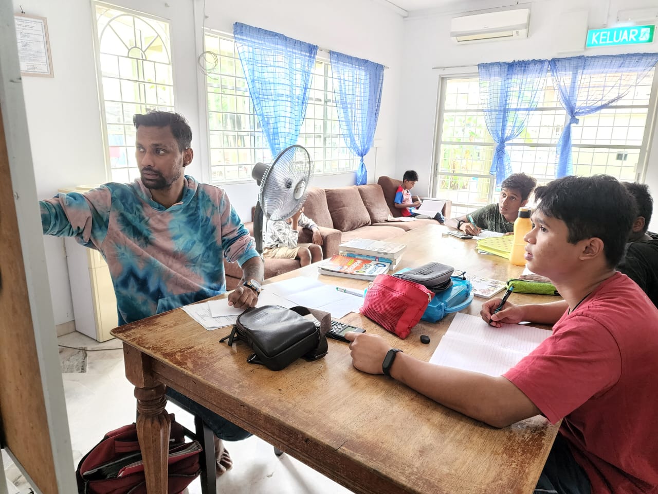Boys with teacher Vik